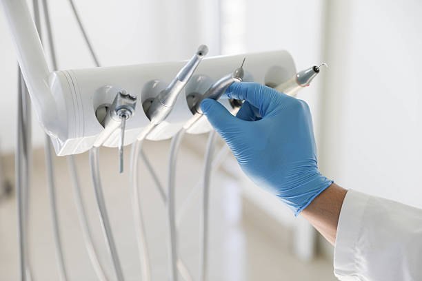Professional Tooth Extraction technician working in Bent Creek, NC